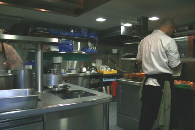 chefs in kitchen environment with Foster Refrigerator equipment