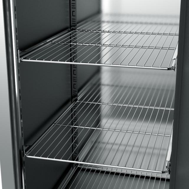 open cabinet with view of stainless steel shelving