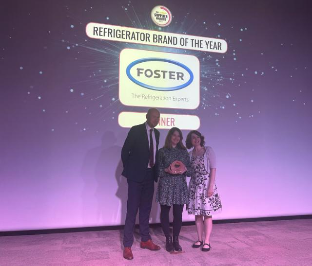 Foster picking up award