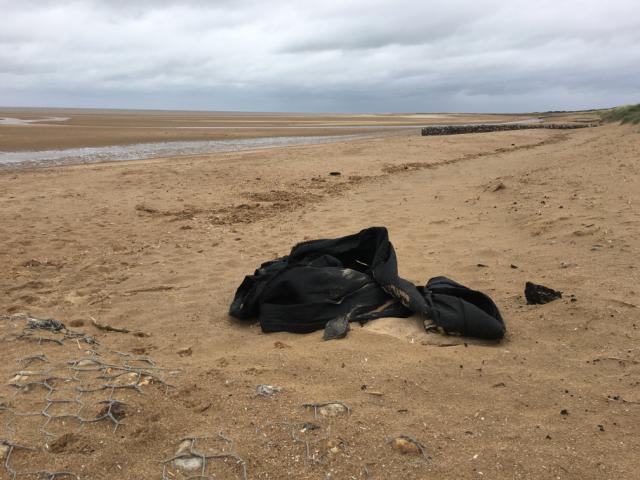 Foster and Gamko staff conducting beach clean