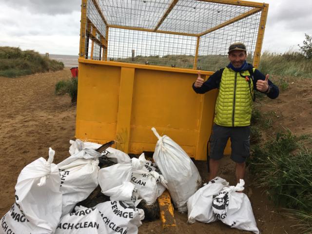 Foster and Gamko staff conducting beach clean