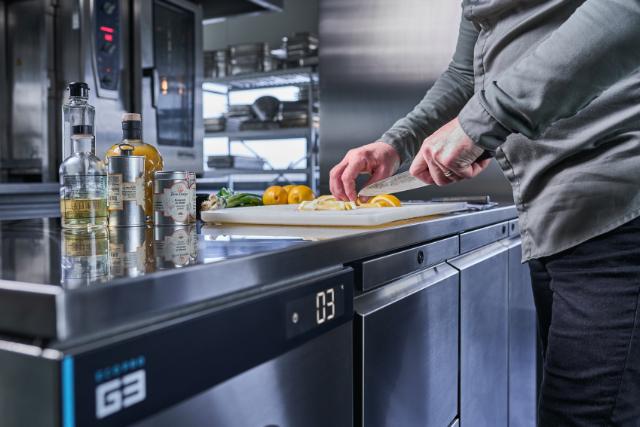 chef prepares ingredients on top of EcoPro G3 counter
