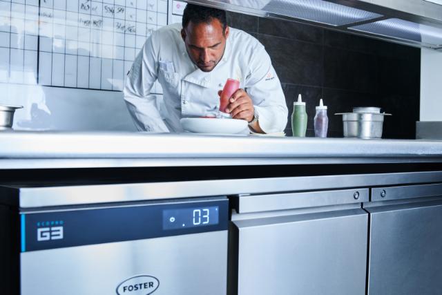 Michael Caines, Michelin Star Holder, preparing dish on top of Foster Refrigerator counter fridge