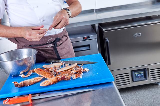 chef prepares lobster